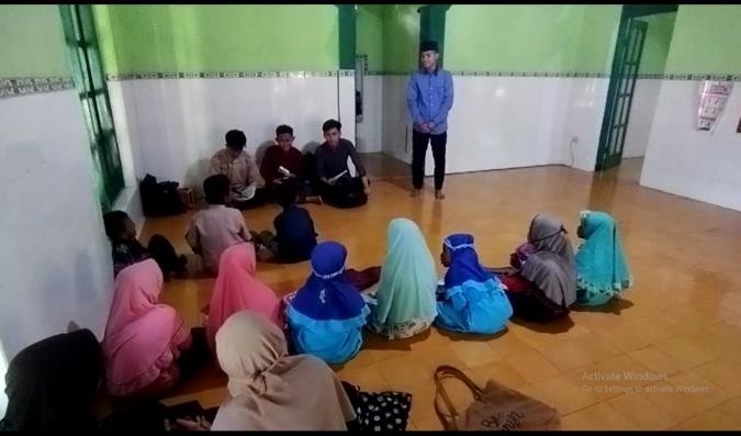 Pendampingan Pengajaran Membaca Al-Qur’an Menggunakan Metode UMMI di TPA Darun Nadwah Desa Demangan Siman Kabupaten Ponorogo